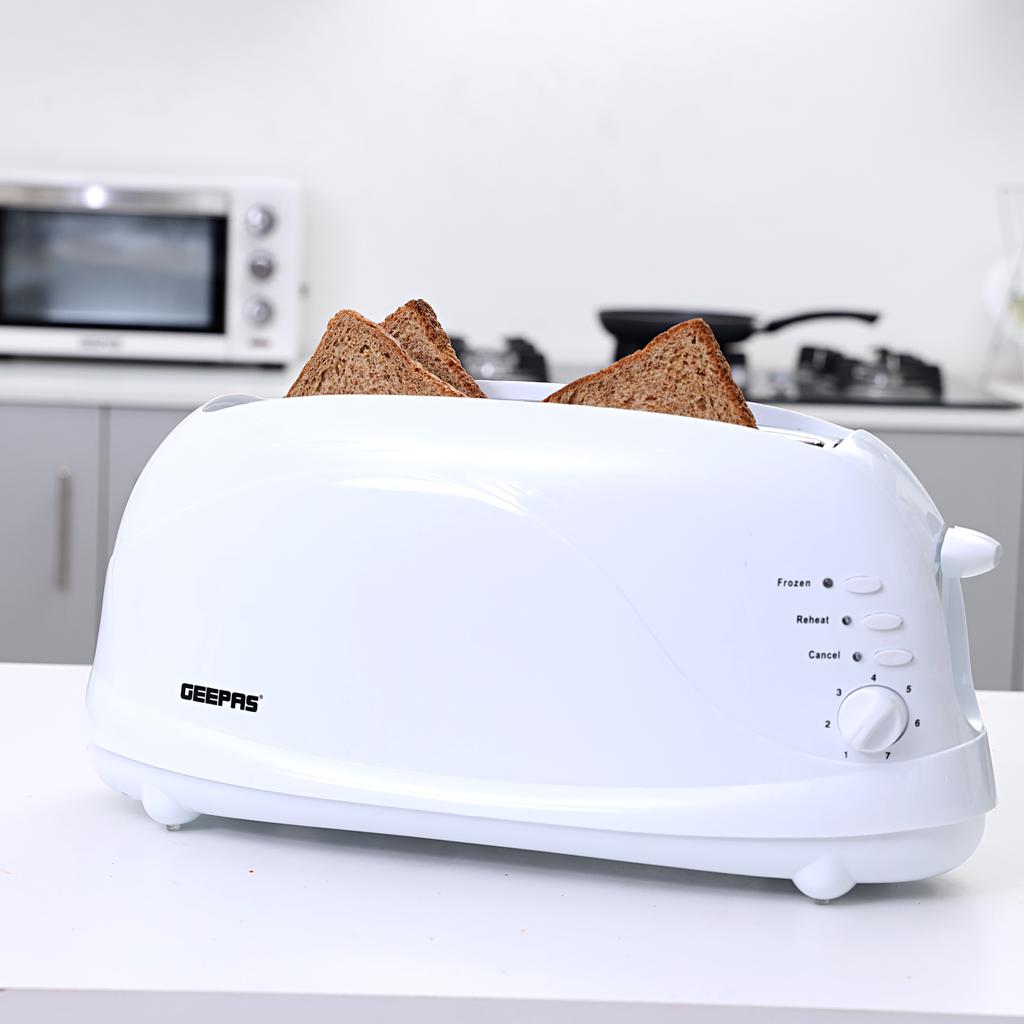 Buy Online Geepas 1100W 4 Slices Bread Toaster - Crumb Tray, Cord Storage, 7 Settings with Cancel, Defrost & Reheat Function |Removable crumb tray |2 years' warranty Shop and Ship in Bahrain