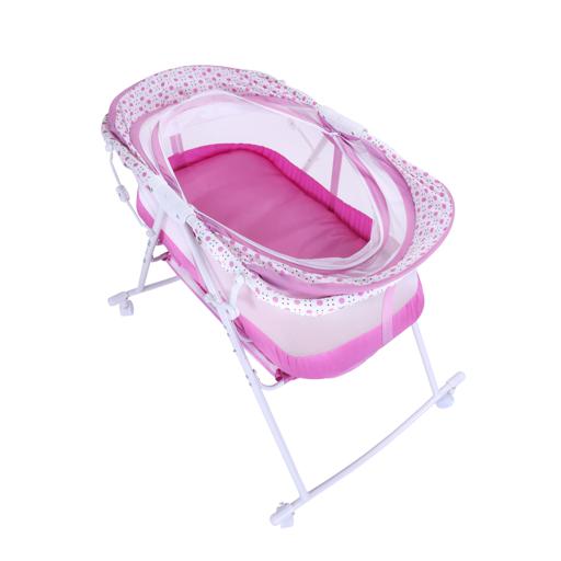 pink bedside bassinet