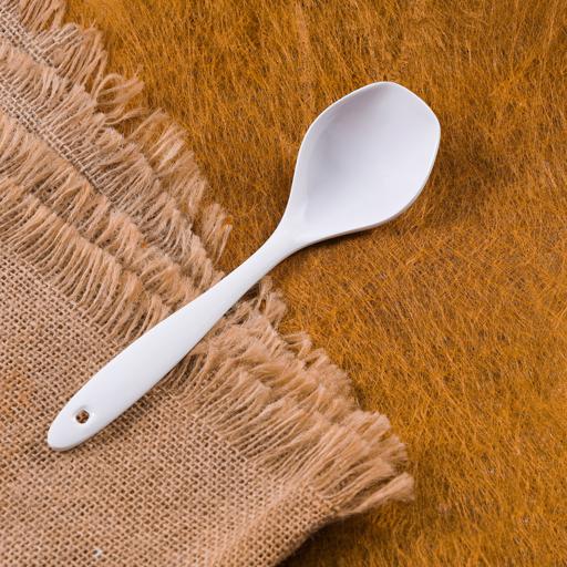 Plastic loop clearance spoon