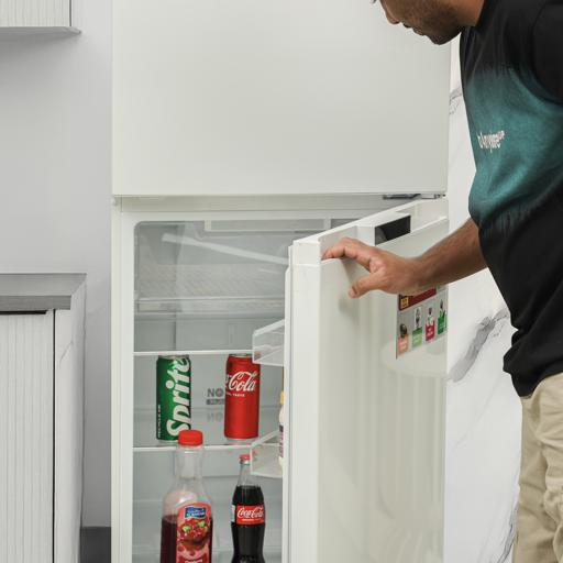 display image 4 for product Geepas Double Door Total No-Frost Refrigerator- GRF2708WPN/ 270 L, Quick Cooling, Equipped with Glass Shelves, Chrome Bottle Holder, Transparent Door Basket and Chiller Shelf/ White, 1-Year Warranty