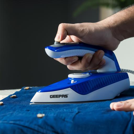 display image 7 for product Geepas GSI7806 800W Dry Iron with Foldable Handle - Non-Stick Coating Plate & Adjustable Thermostat Control | Steam Shot, Transparent Water Tank, Durable Material | 2 Years Warranty