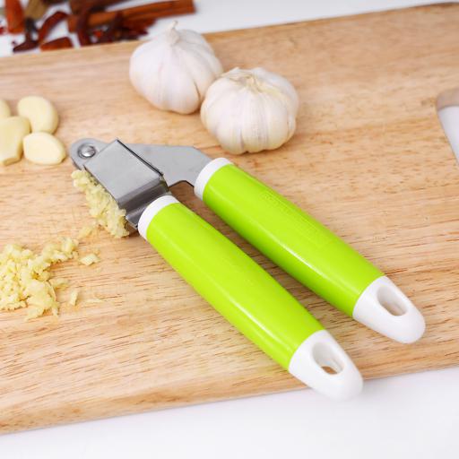 display image 1 for product Royalford Garlic Press With Plastic Handle - Super Easy To Clean - Crush Garlic & Ginger With Ease